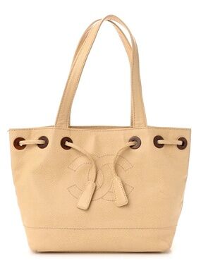Authentic CHANEL caviar leather wood CC mini drawstring bucket bag
